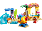 Strandspeelset met Stitch- en Lilo-figuren, een glijbaan en een ijskraampje.