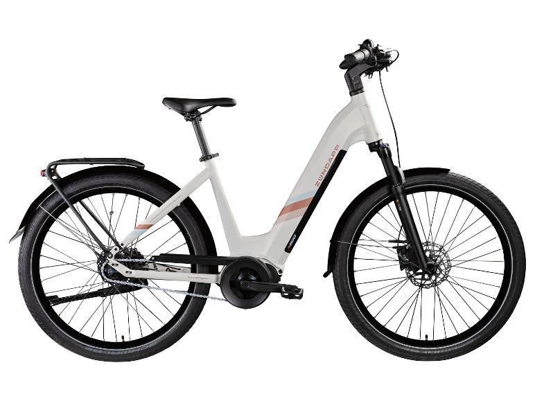 Witte Zündapp elektrische fiets met bagagedrager en spatborden.