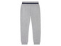 Grijze joggingbroek met blauwe tailleband.