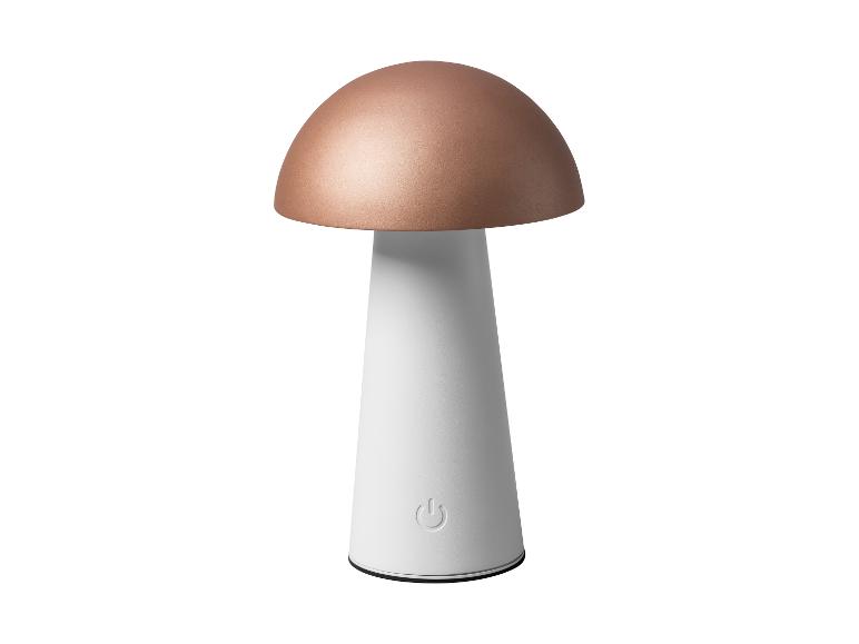 Paddestoelvormige tafellamp met koperen bovenkant en witte voet, met aan/uit-knop.