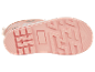 Roze zool van een kinder regenlaars met dierenprint.