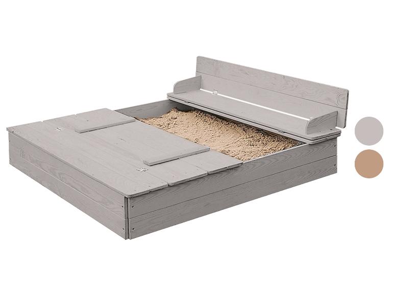 Grijze houten zandbak voor kinderen.