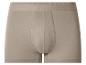 Beige herenboxershort met elastische tailleband.