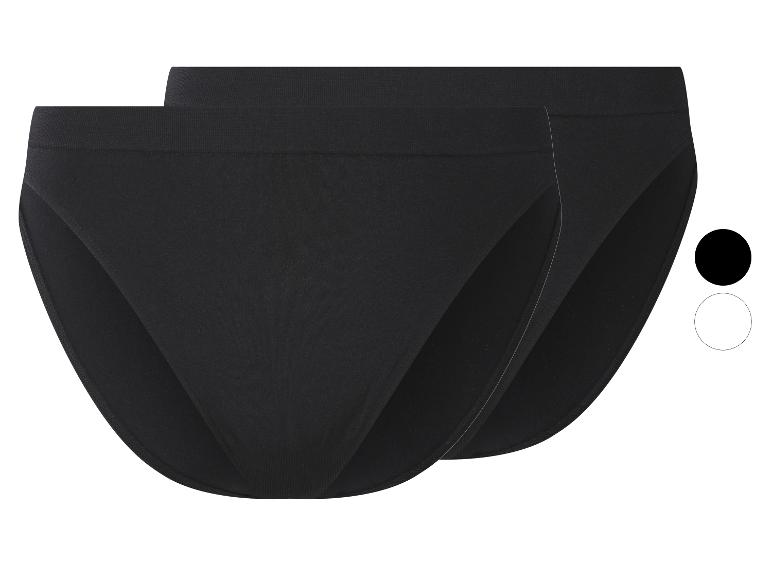 Twee paar zwarte damesonderbroeken op een witte achtergrond.