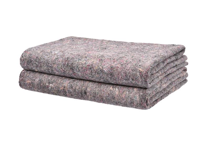 Gestapelde grijze verhuisdekens