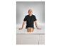 Andre Agassi presenteert de Silvercrest premium kookpan met koperlaag.