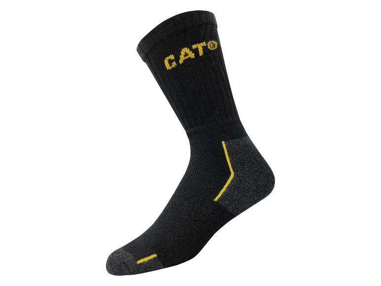 Zwarte sok met geel CAT® logo en details.
