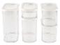 Een set van vier transparante opbergdozen met witte deksels.