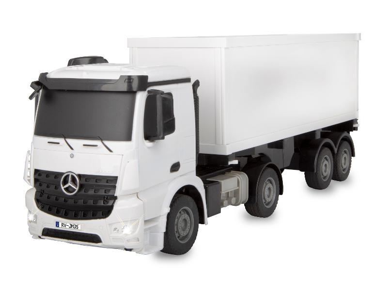 Wit model Mercedes-Benz Actros vrachtwagen met aanhanger.