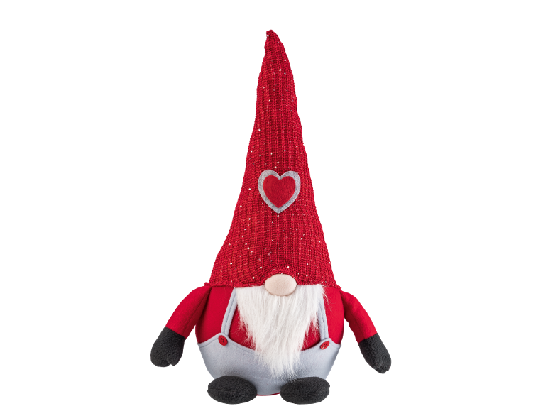Pluchen kabouter met rode muts, baard en hart, perfect voor feestelijke decoratie.