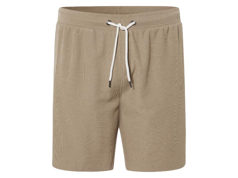 Beige shorts met trekkoord.