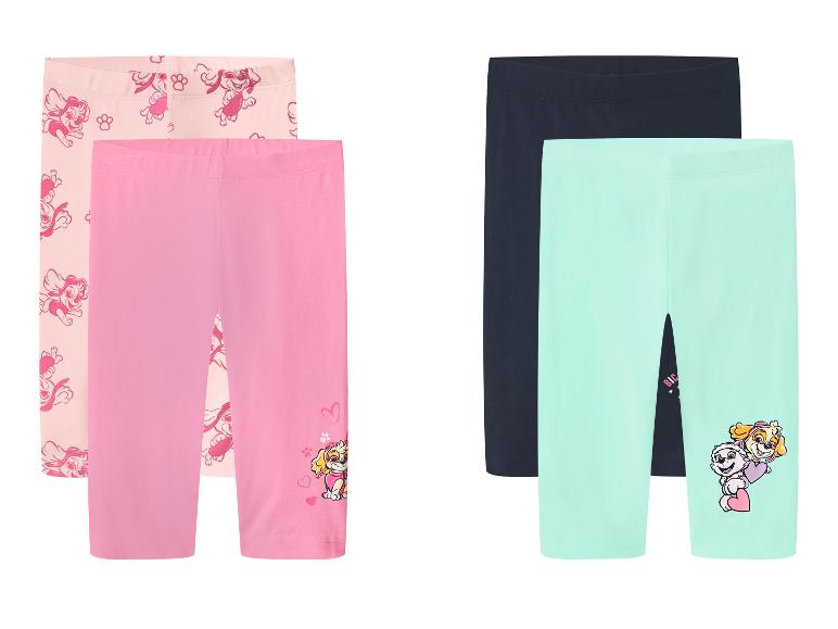 Set van 4 korte meisjesleggings met puppyprints, in roze, beige, marineblauw en mintgroen.