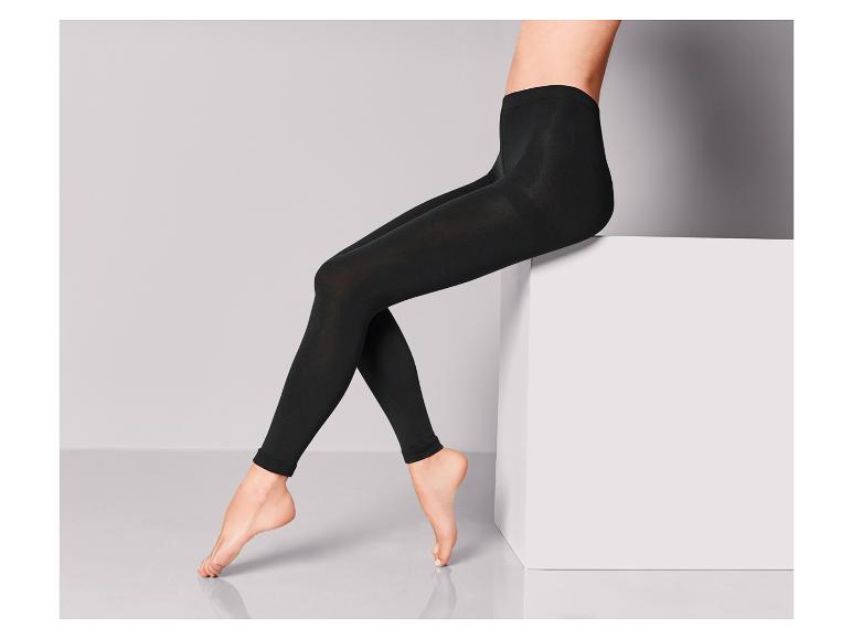 Zwarte leggings voor dames, gefotografeerd op een witte achtergrond.