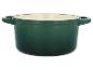 Groene gietijzeren pot van Le Creuset.