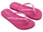 Roze teenslippers met 'Copacabana by Ipanema' tekst en maten UK 4, EUR 37.