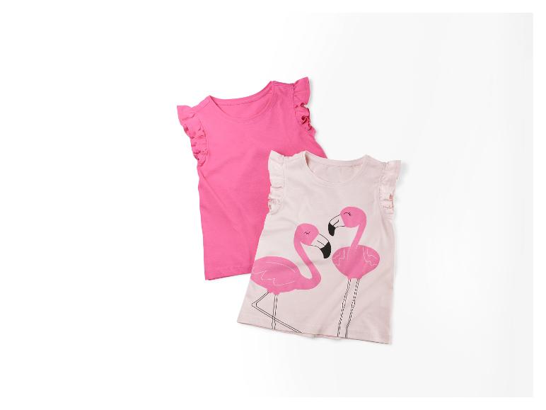 Twee zomertopjes voor meisjes: een roze effen topje en een met flamingo print.