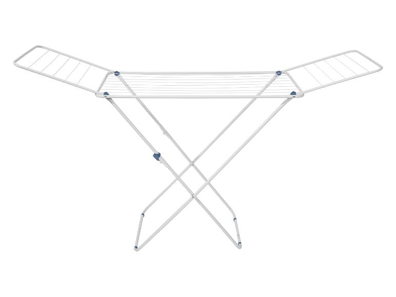 Wit wasrek met blauwe accenten, uitgevouwen en klaar voor gebruik.