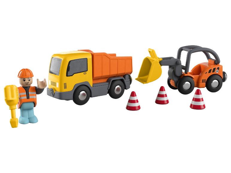 Houten speelgoed: kiepwagen, shovel en werkman.