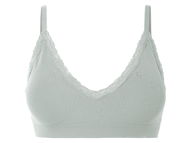 Een lichtgroene, geribbelde bh met kant.