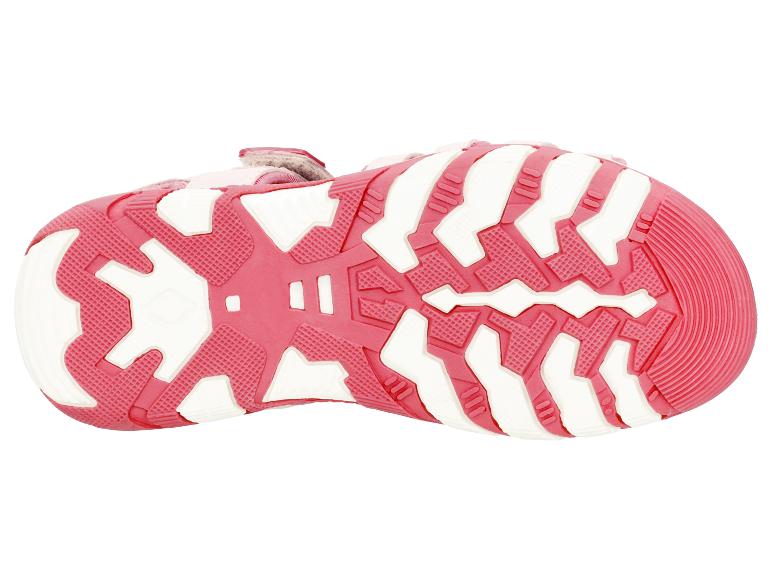 Zool van een roze en witte kindersandaal, onderaanzicht.