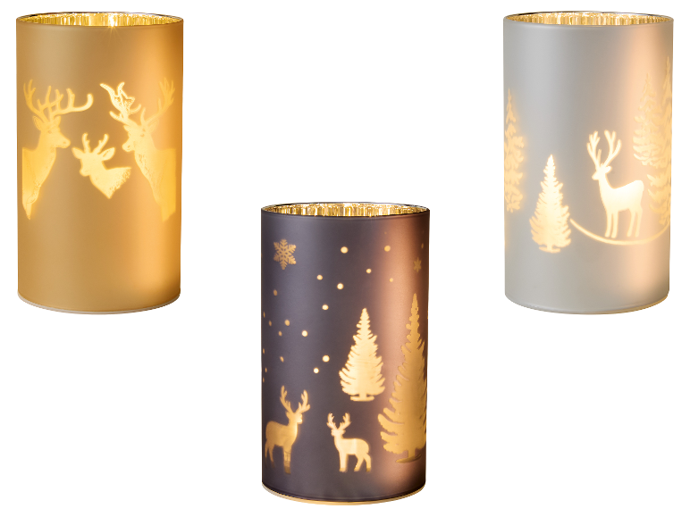 Drie LIVARNO® LED-windlichten met kerstmotieven: herten en kerstbomen.