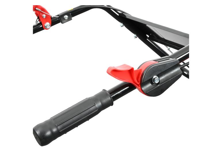Close-up van een zwart handvat met een rode trekker op een machine.