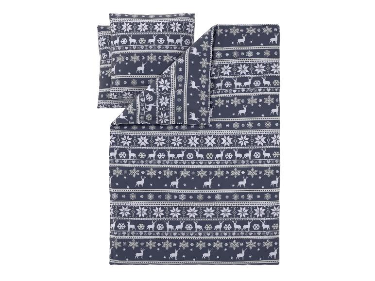 Beddengoed met rendier- en sneeuwvlokkenpatroon.