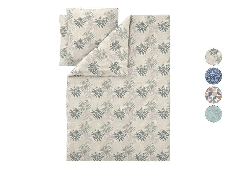 Dekbedovertrekset met palmbladpatroon in beige en groene tinten.