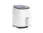 Een witte Cosori Airfryer met een digitaal display.