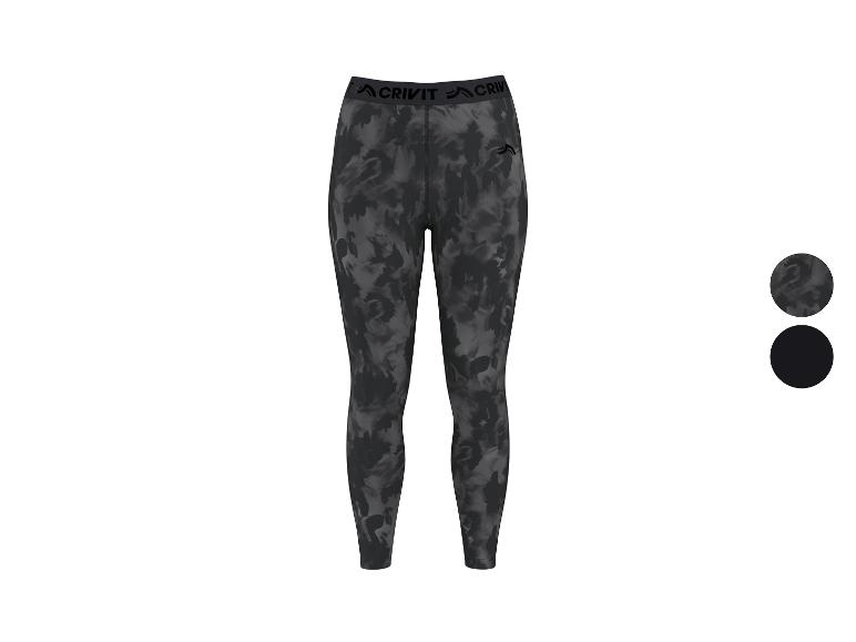 Dames sportlegging met grijs en zwart camouflagepatroon en logoband.