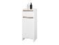 Witte badkamerkast met lade en deur, lichte houten accenten en decoratieve items.