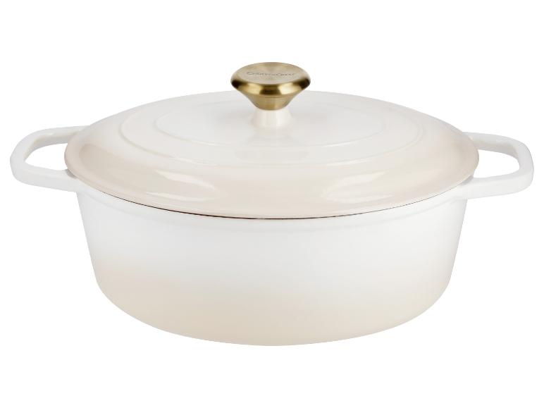 Crèmekleurige geëmailleerde gietijzeren braadpan met deksel en gouden knop