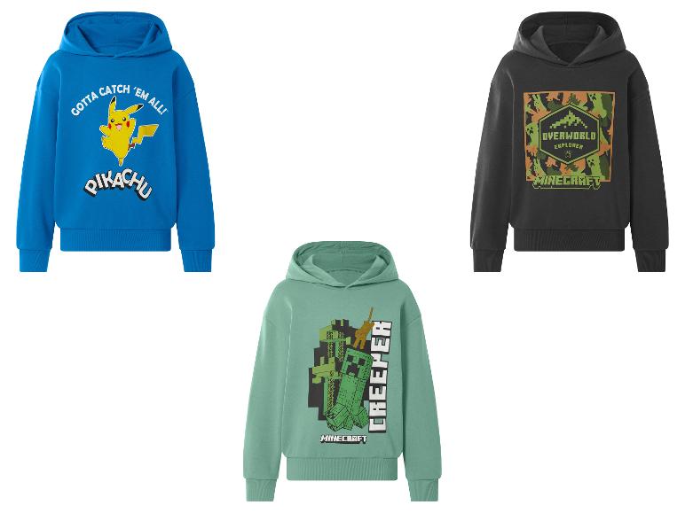 Kinderhoodies: een blauwe met Pikachu, een groene met Creeper en een grijze met een Overworld-ontwerp.
