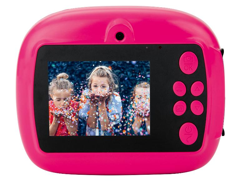 Roze digitale kindercamera met scherm waarop drie meisjes confetti blazen.