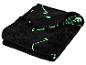 Zwarte deken met glow-in-the-dark skeletpatroon, opgevouwen.