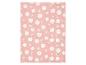 Roze deken met een patroon van witte bloemen en bladeren.