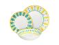 Set witte borden en kommen met gele en turquoise patronen