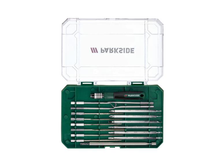 Precisieschroevendraaierset met handvat en diverse verwisselbare bits in een groene koffer.