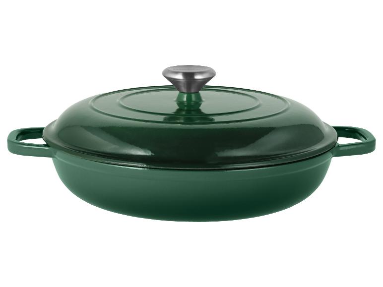 Groene gietijzeren braadpan met deksel en zilverkleurige knop