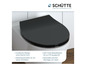 Een zwart toiletbril van Schütte met een softclose mechanisme.