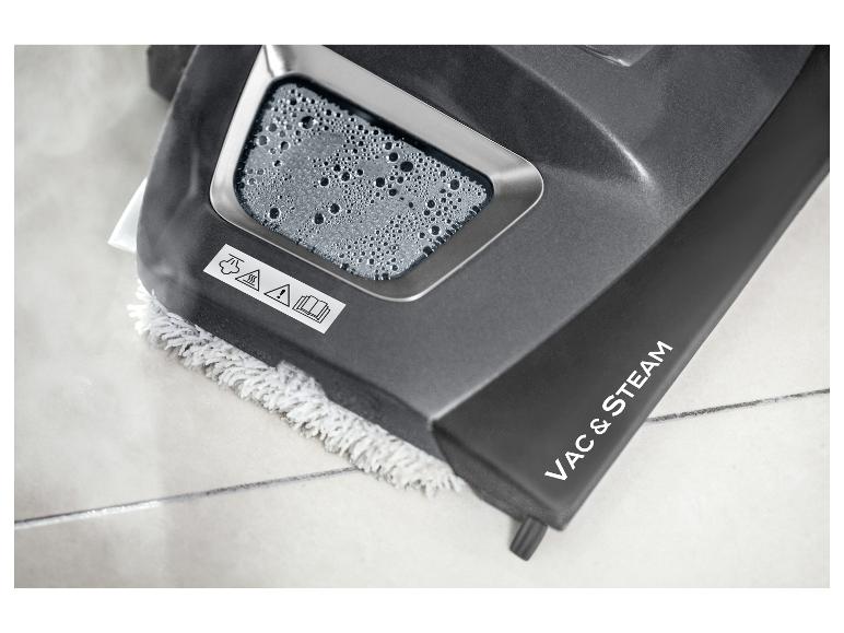 Nat-/droogzuiger met stoomfunctie en dweil op een tegelvloer.
