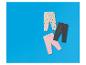 Drie kinderleggings: beige met hartjes, roze en donkergrijs.