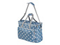 Een blauwe polka dot-tas met handvatten en schouderband.