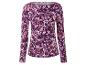 Een roze en paarse longsleeve met bloemenprint.