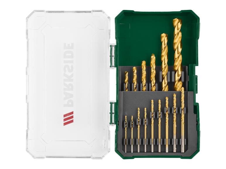 Set gouden boren in een groene en transparante koffer.