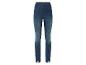 Donkerblauwe skinny jeans met splitten aan de onderkant.