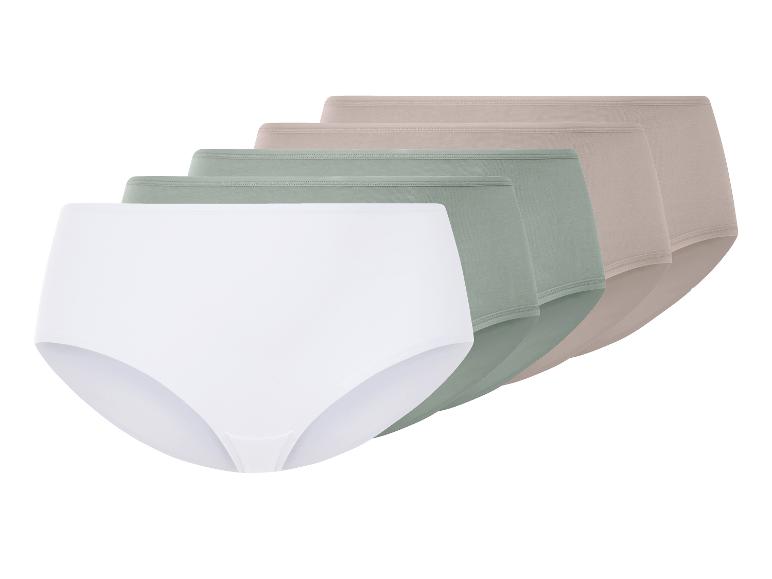 Set van witte, groene en beige slips.