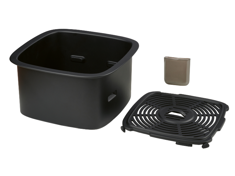 Airfryer mand met een verwijderbare grillplaat en een klein accessoire.