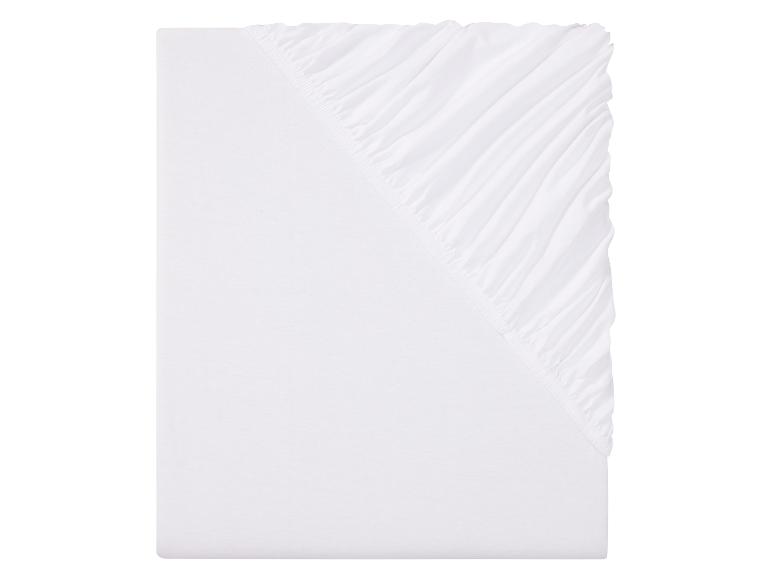 Wit, effen hoeslaken.