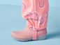 Roze regenlaarzen met regenbroek met regenboogprint.
